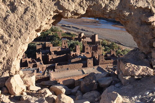 Aït Benhaddou: Looking down through a hole in the wall at the ornate entrance towers